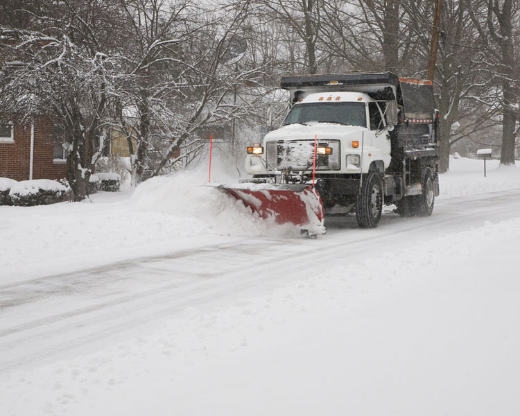 This is Commercial snow ploughing Image